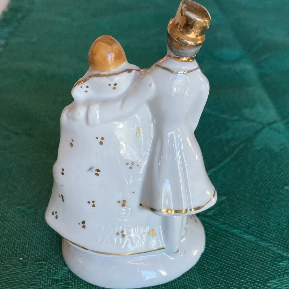 VINTAGE CAKE TOPPERS, 2 couples, 1 white porcelain w/gold, 1 rustic. $19
